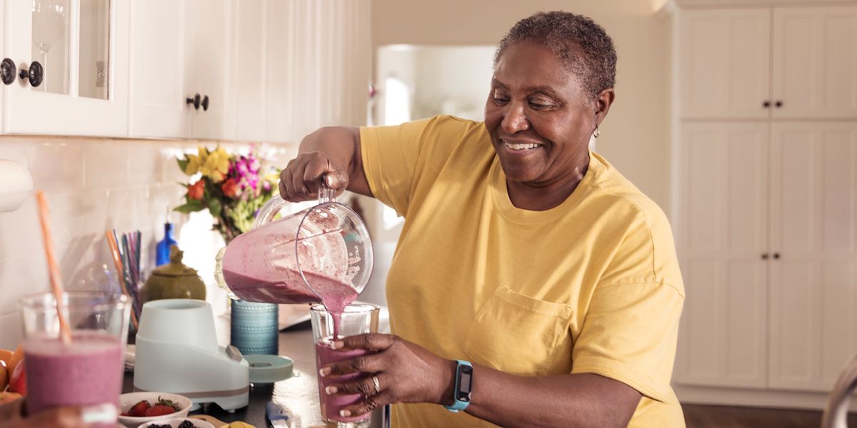 senior African American woman in kitchen