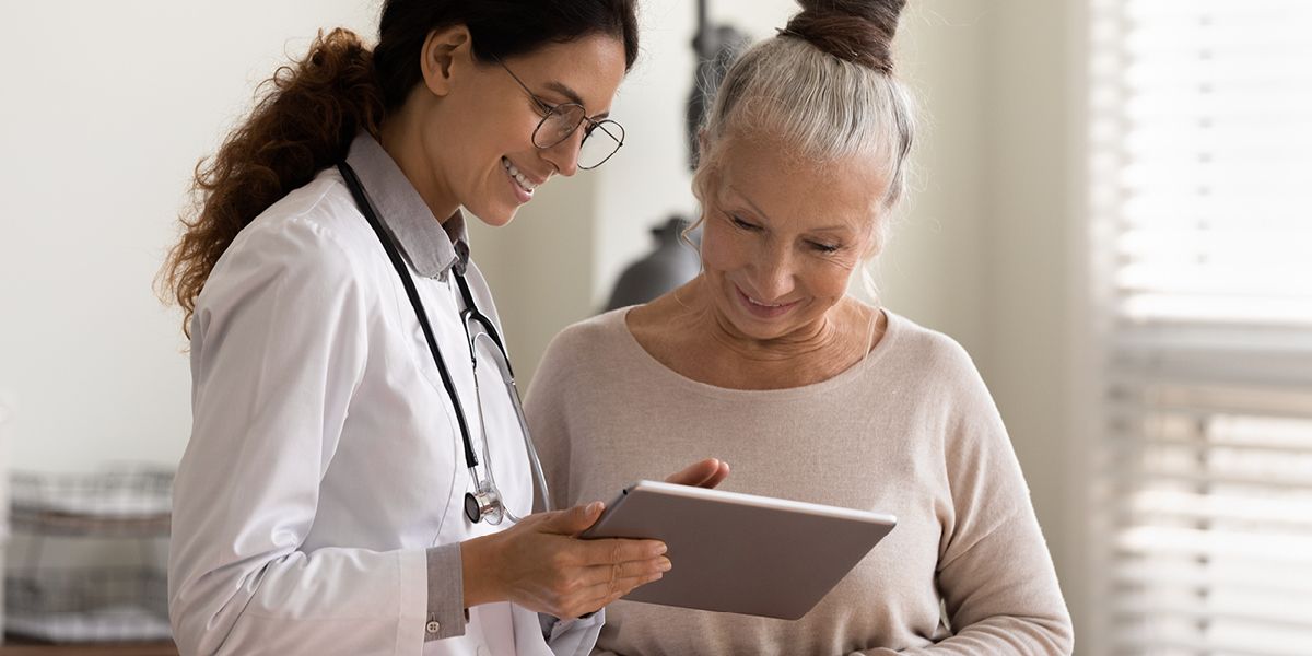 doctor and patient discussing charts