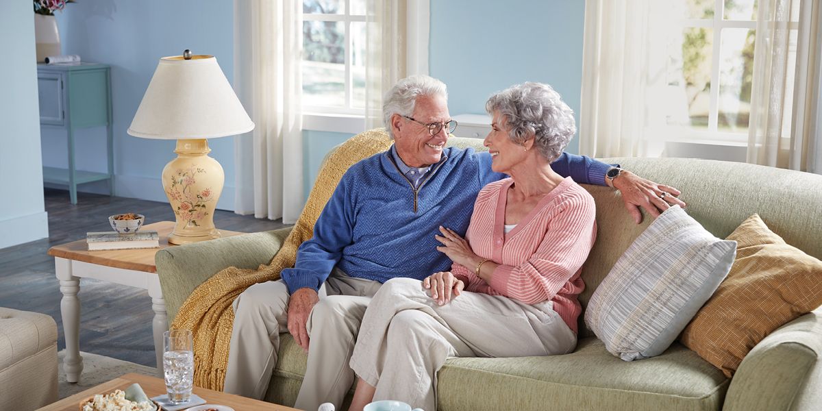 senior man and woman talking 