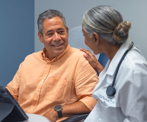 Senior patient with doctor