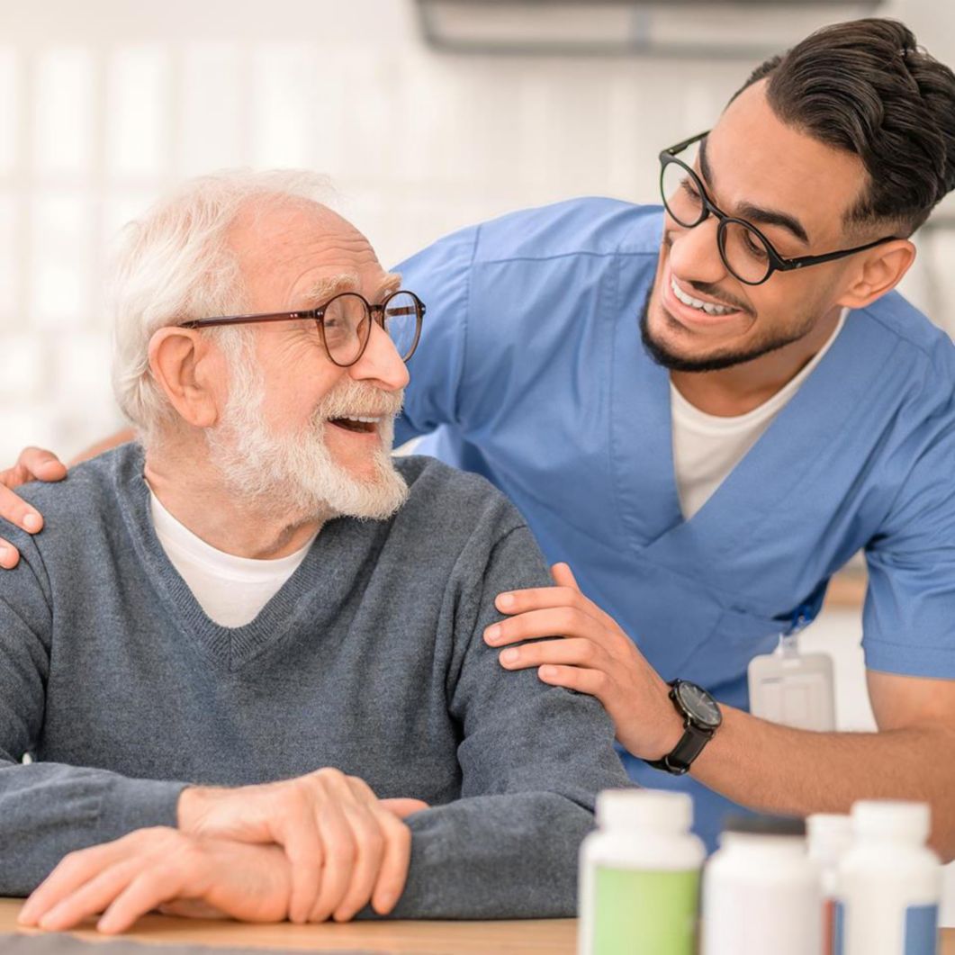 Nurse smiling at a man