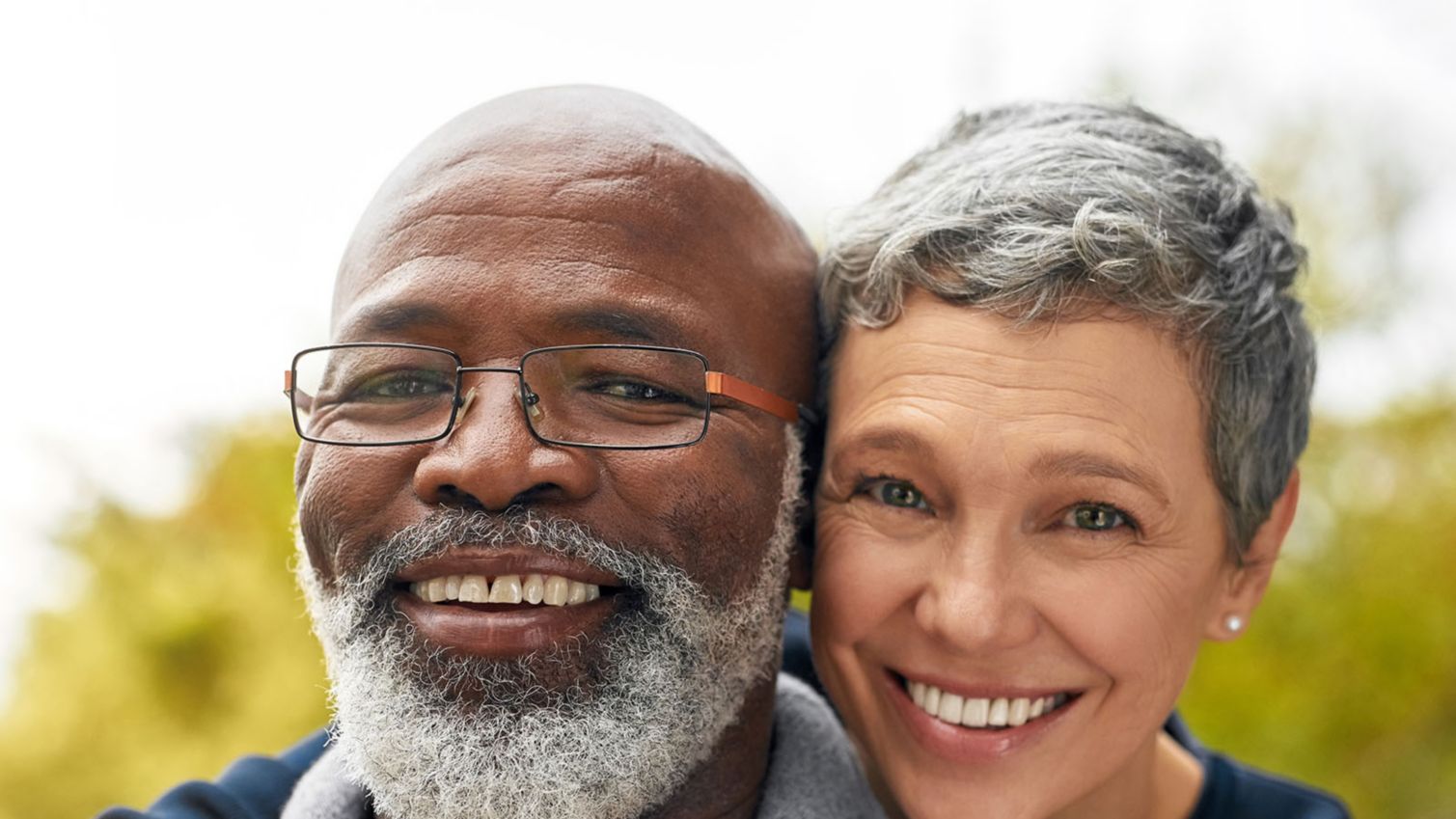 Couple smiling for the camera.