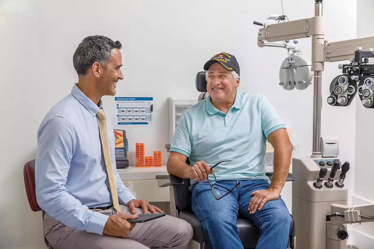 Senior man having eye exam in optometrist doctor office