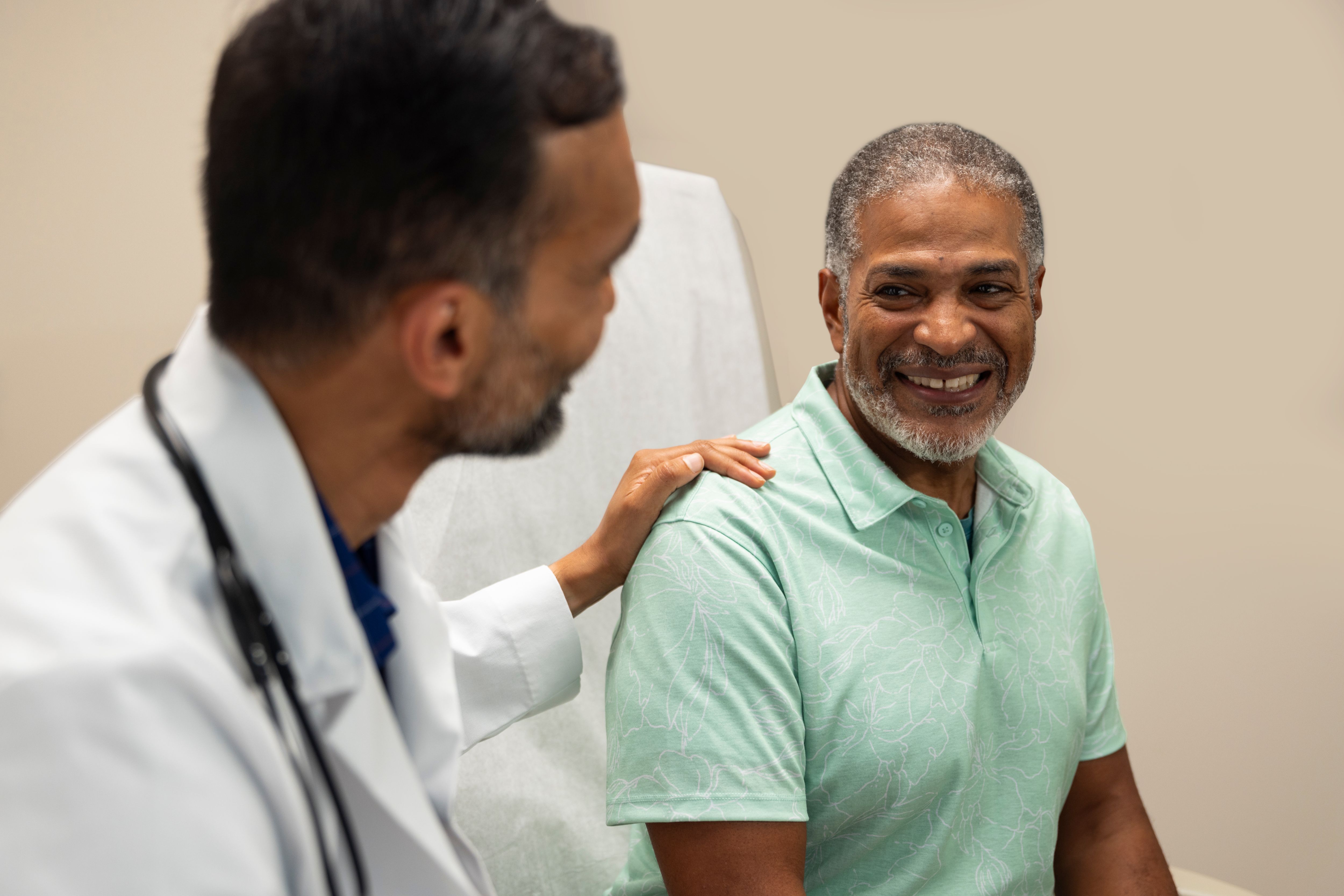 Woman sitting with her doctor