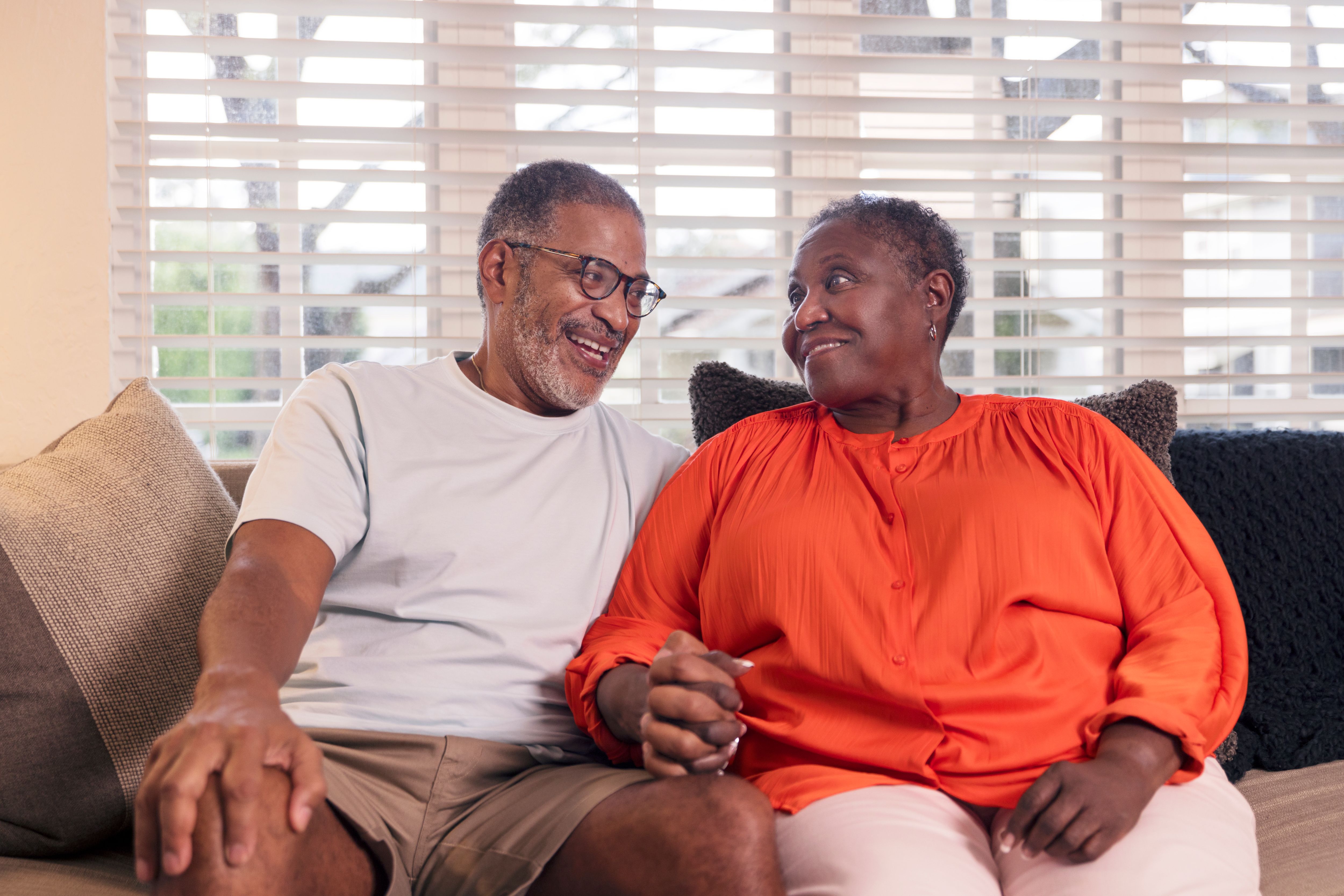 Black couple indoors at home