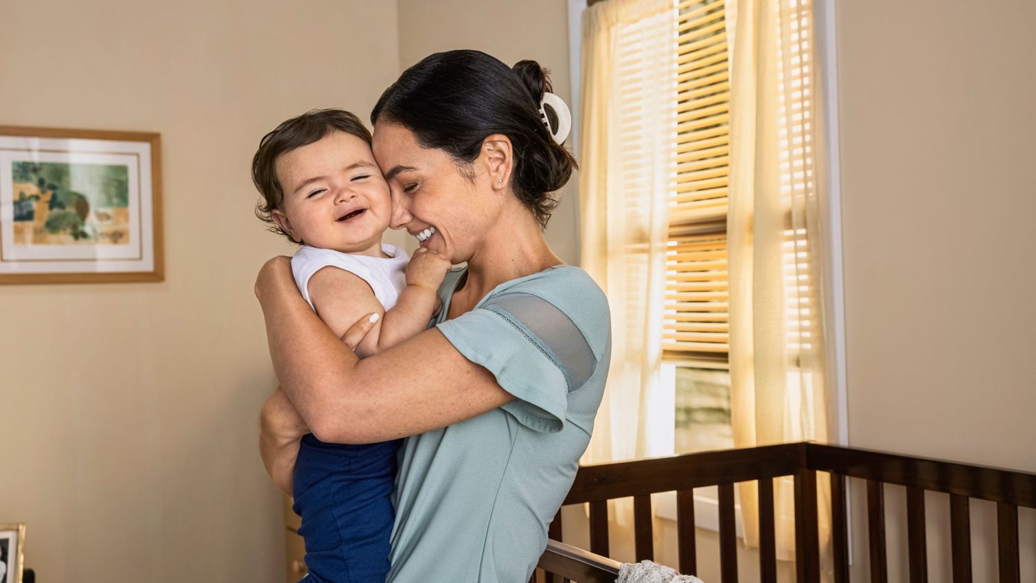 Parent holding infant