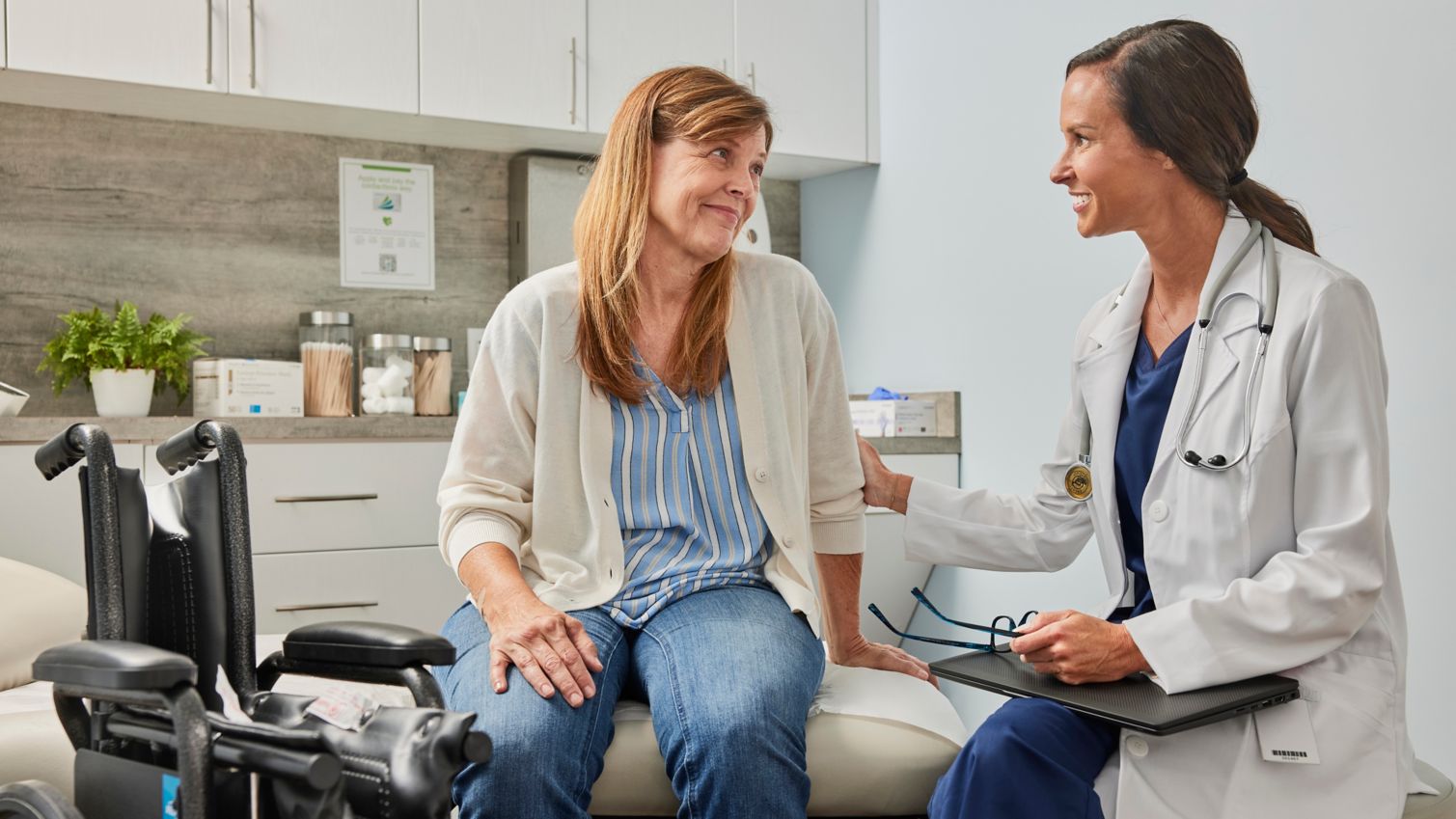 Provider and patient talking.