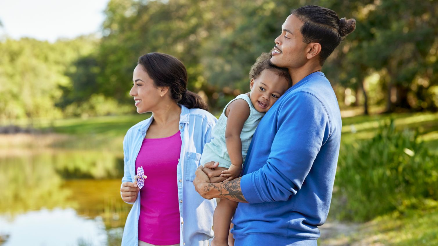 Family looking out at a pond