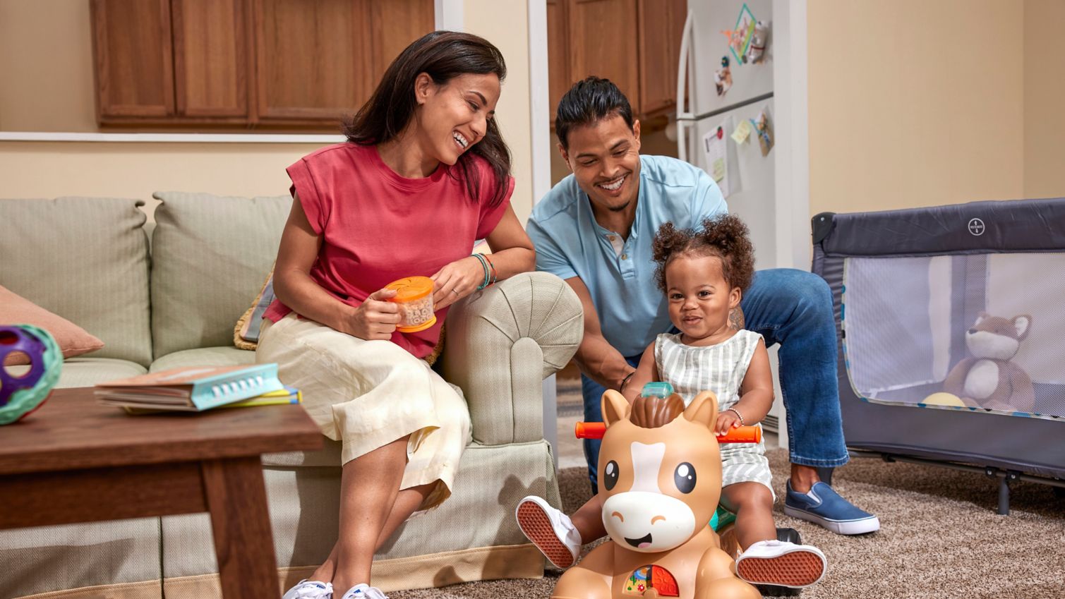 Family on a sofa in a living room.