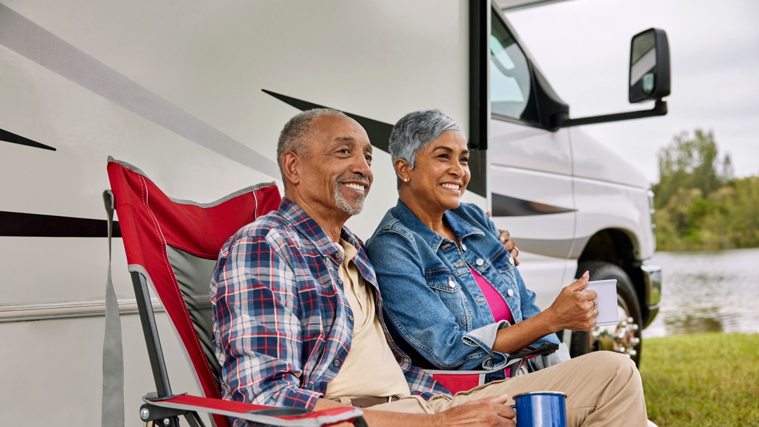 Seniors camping with Recreational Vehicle