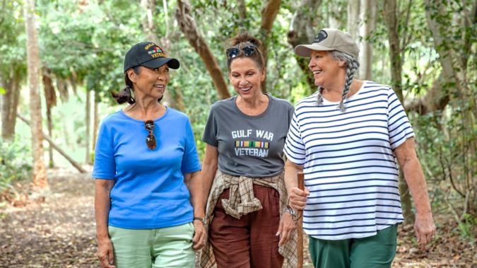 Group of seniors taking a nature walk together