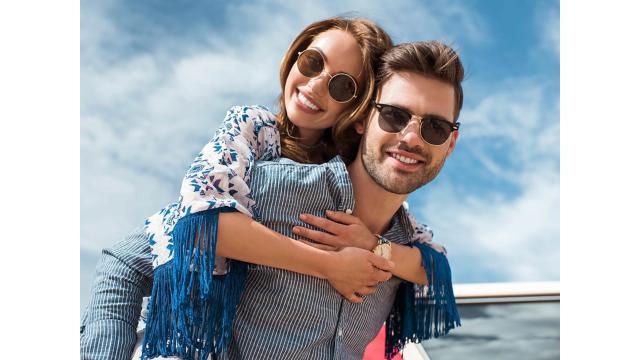 a man and woman wearing sunglasses