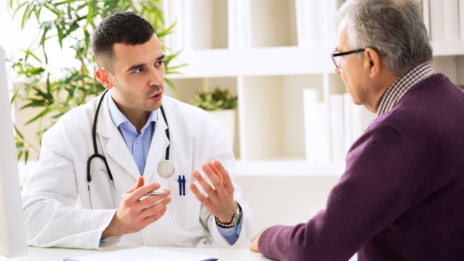 Doctor talking with patient.