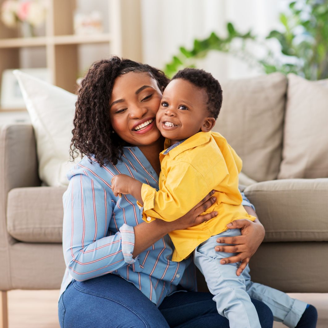 A mom and her young daughter share time together at home.