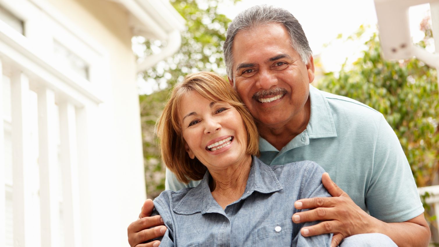 Couple smiling for the camera.