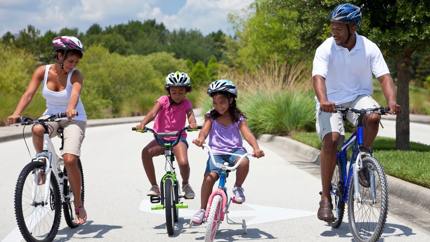 Family riding bikes together.