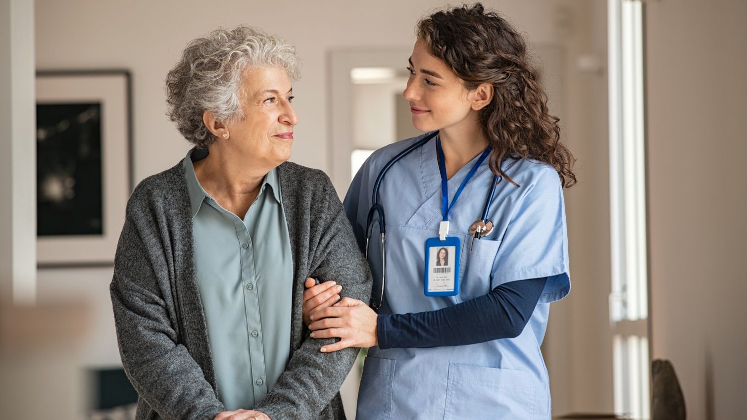 Nurse smiling at a woman