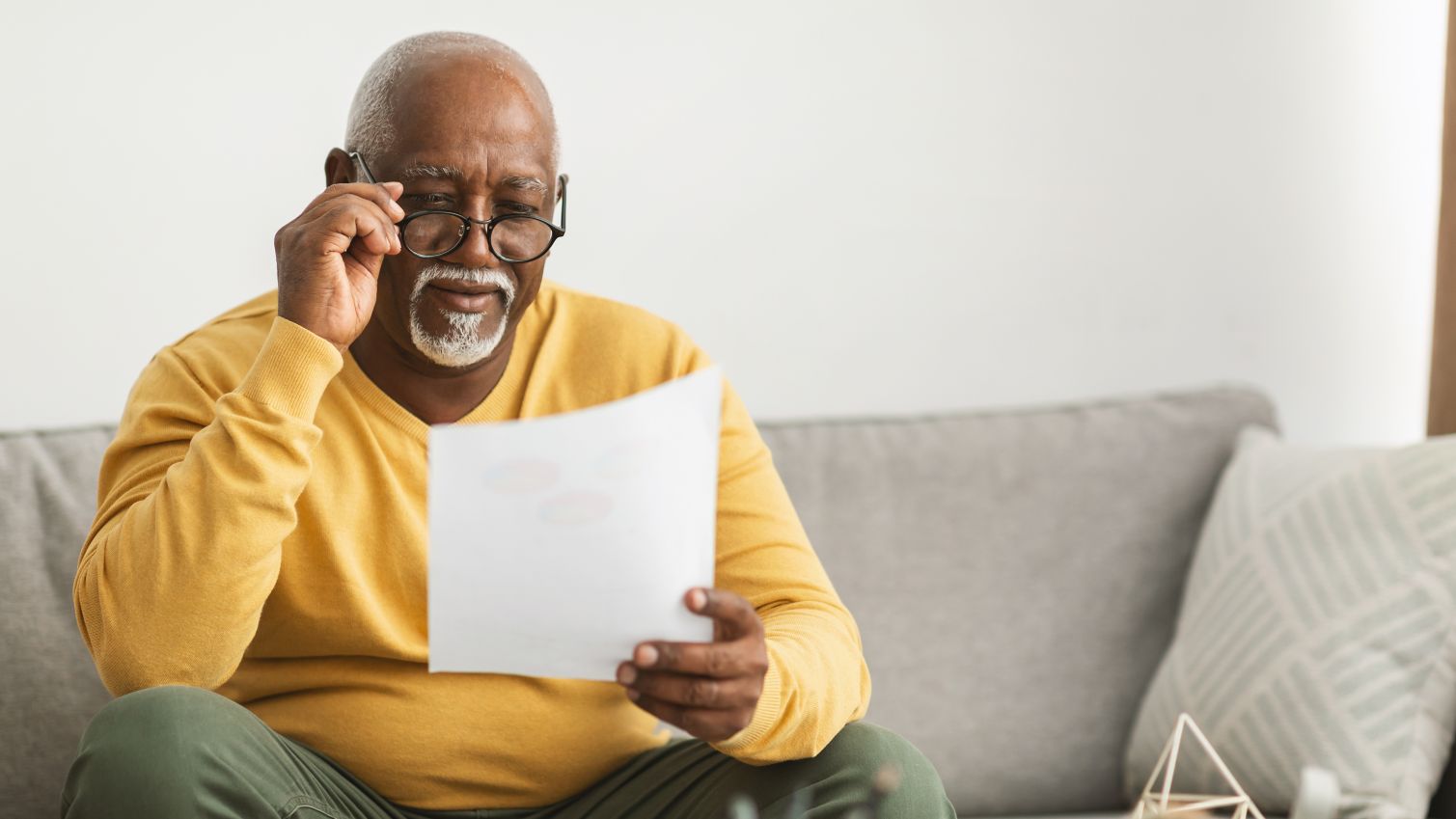 Member reading notes from paper