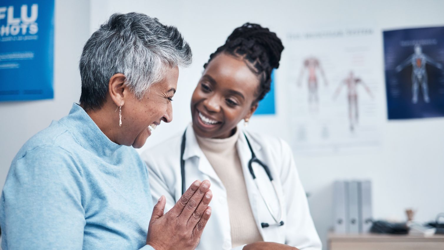 Female doctor consults female patient.