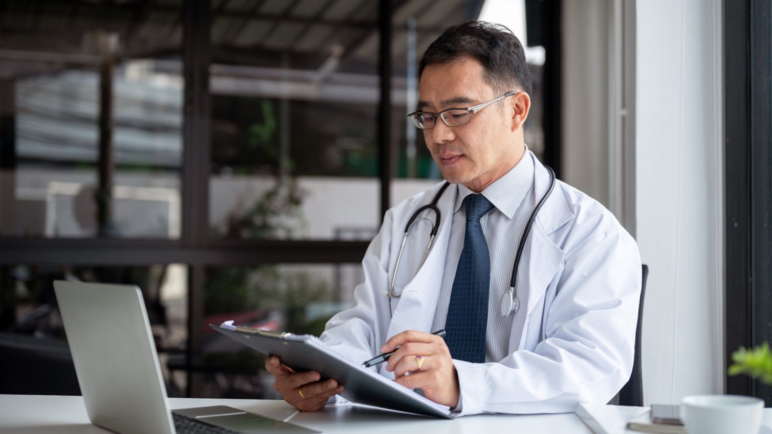 provider reading documents.