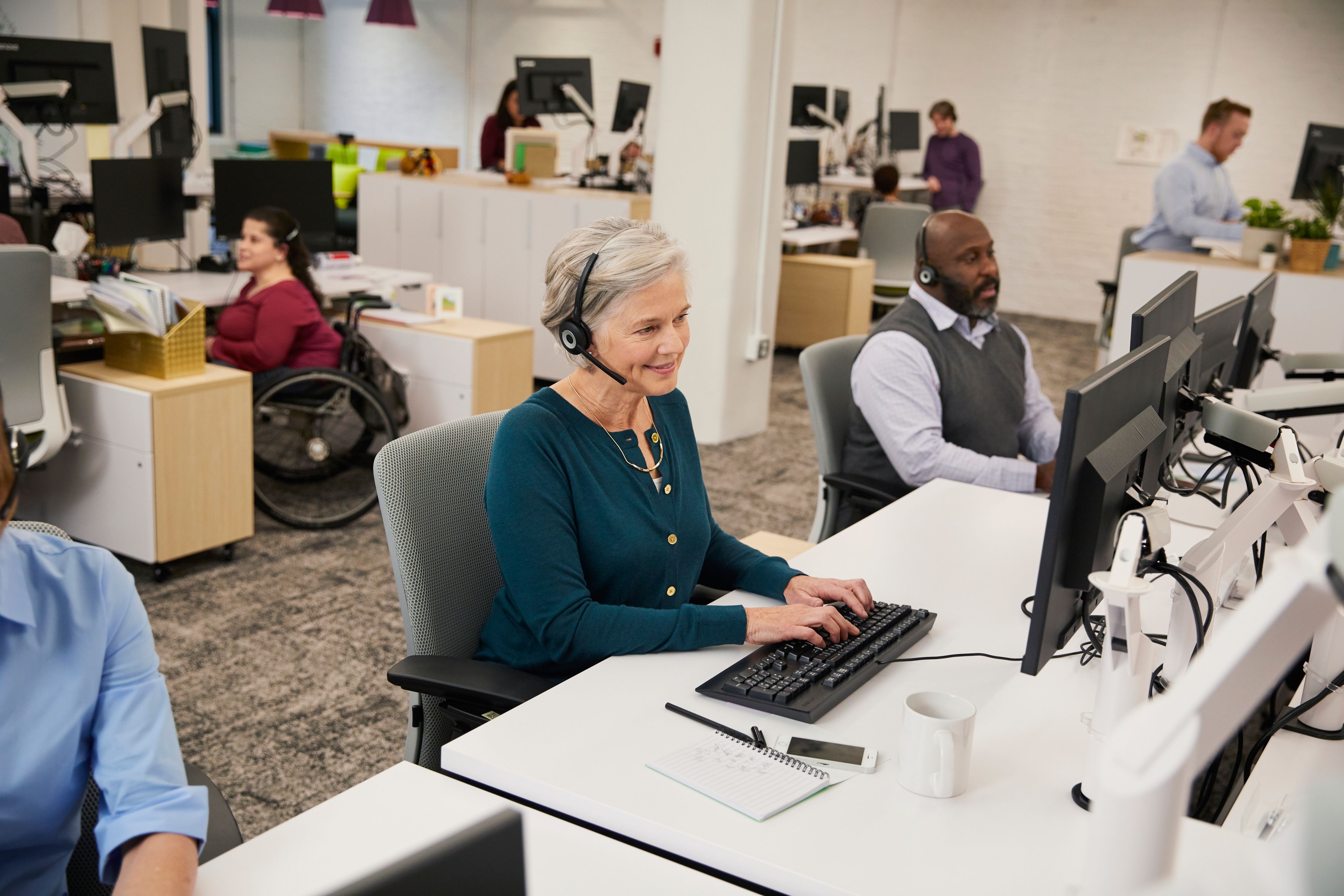Smiling woman working in call center