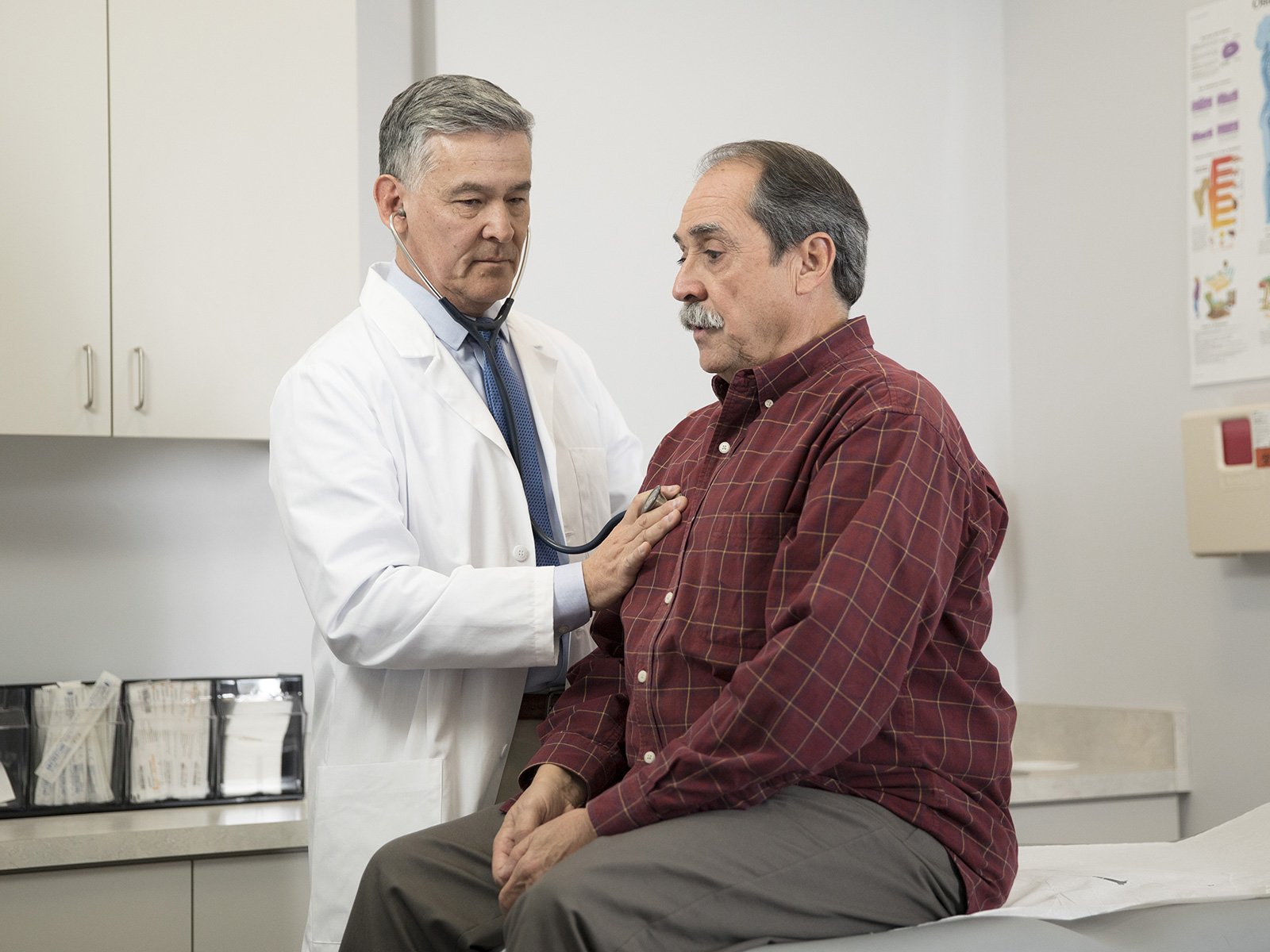 Older man getting a check up