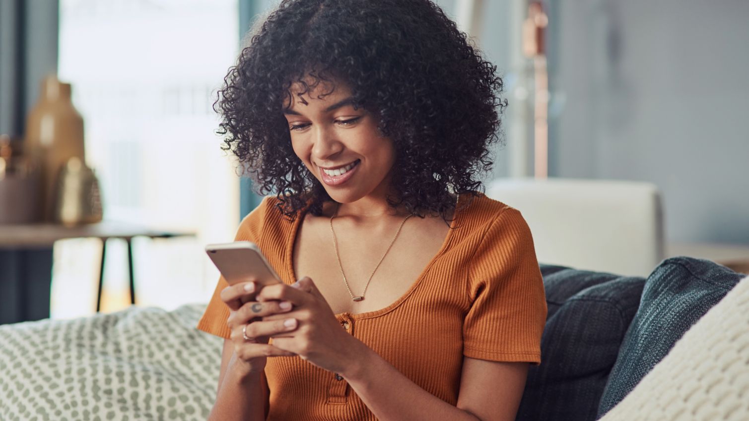 Medicaid member accesses MyHumana on her phone