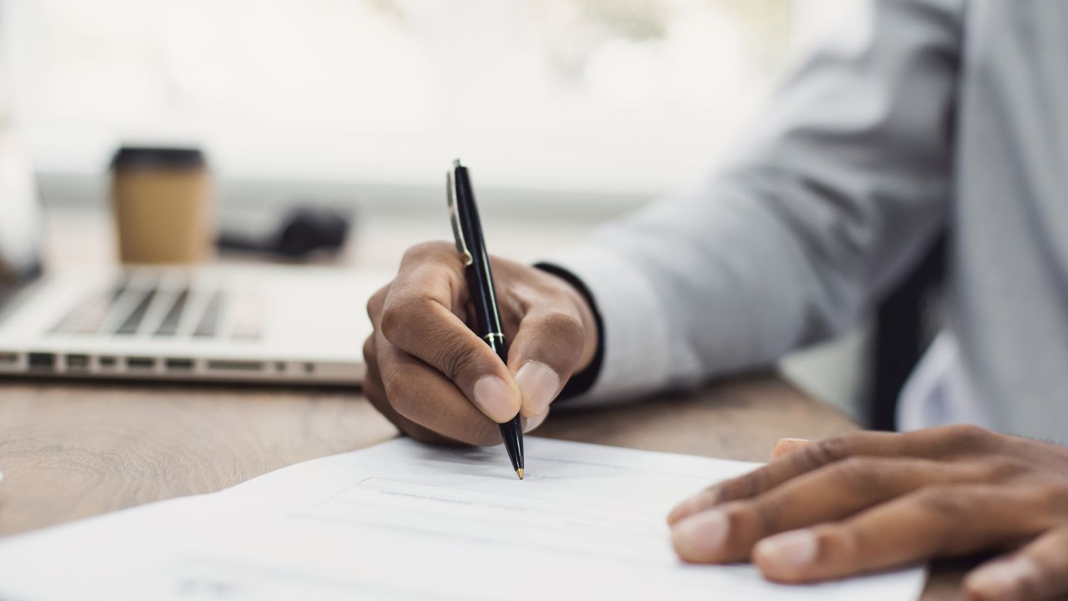 Medicaid provider signs a form