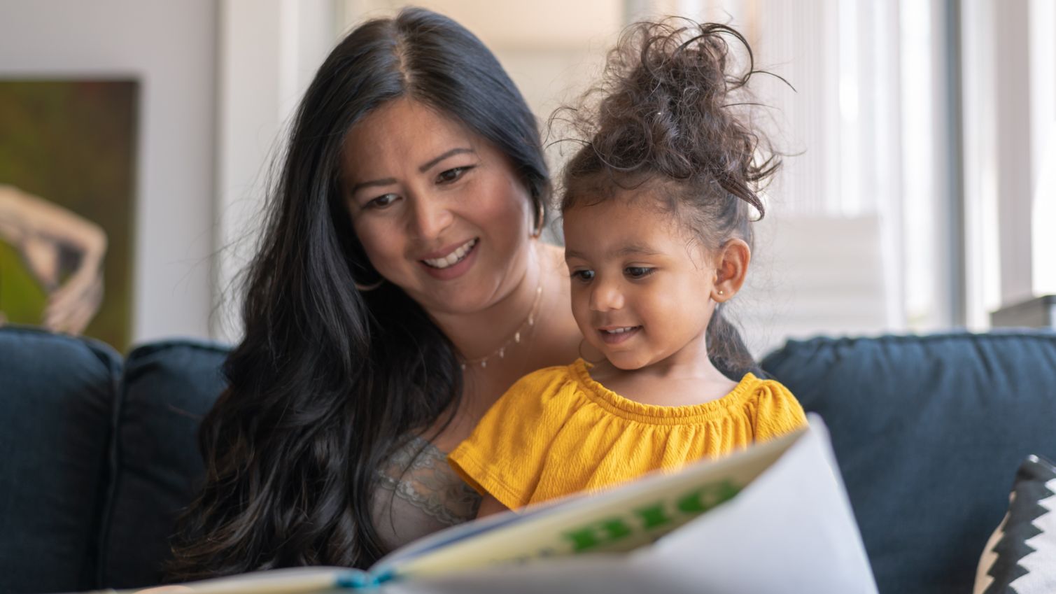 Mom and daughter read together