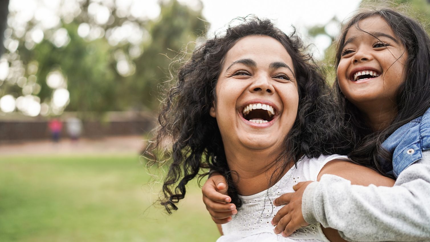 Mom and daughter play outside