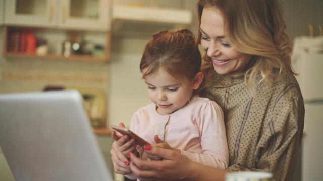 Mom and daughter looking at phone