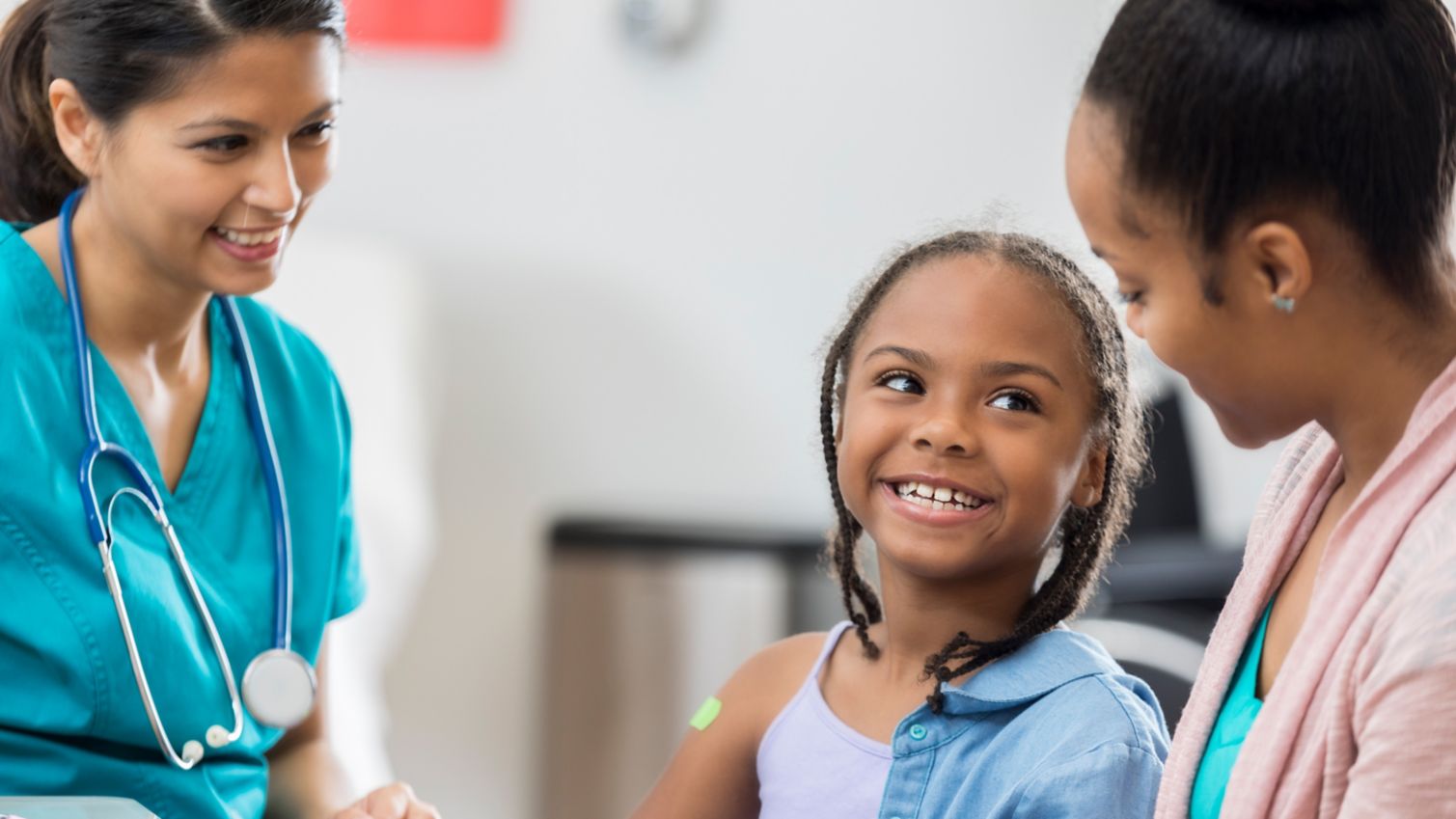 Medicaid provider talks to girl and her mom