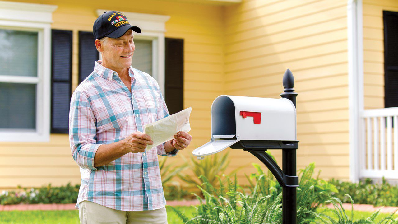 Man at mailbox