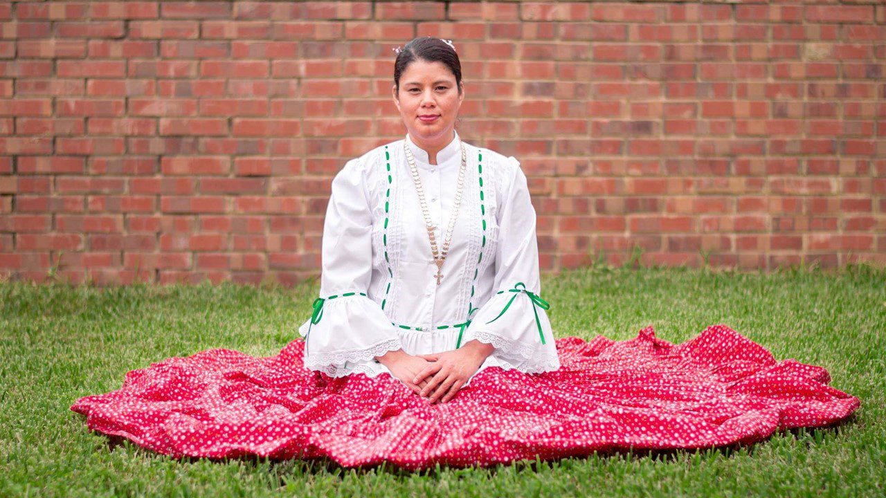 Woman sitting with her skirt around her