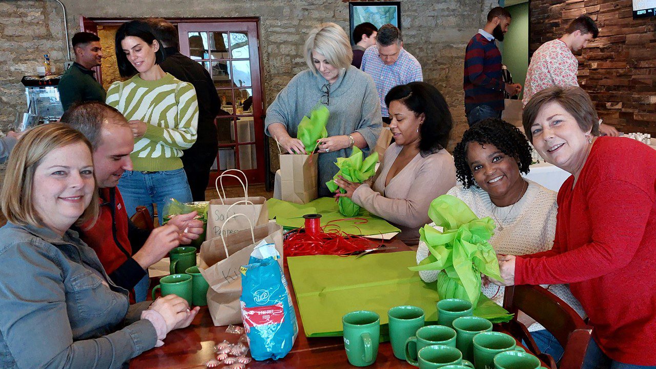 People wrapping gifts