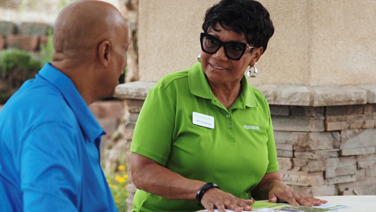 African American woman and man speaking about Medicare Advantage plans