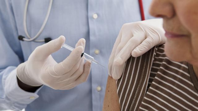 A patient receives an injection. 