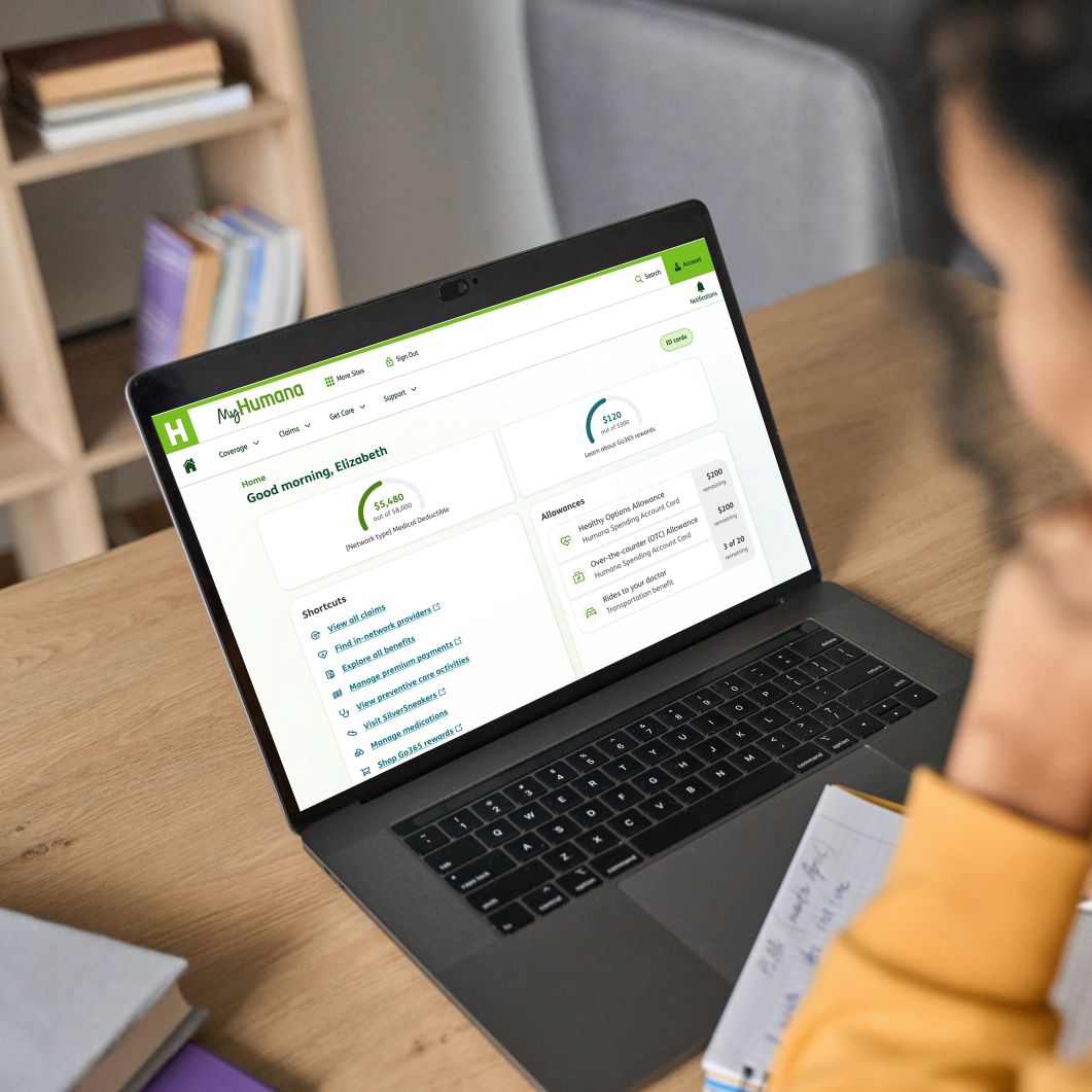 A woman reviews her plan details online.