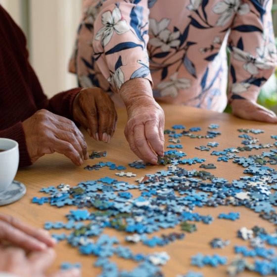 People solving a puzzle