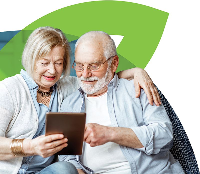 Senior couple using an iPad to access the CenterWell health portal