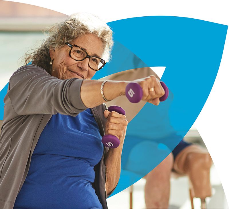 Senior woman exercising with dumbbells