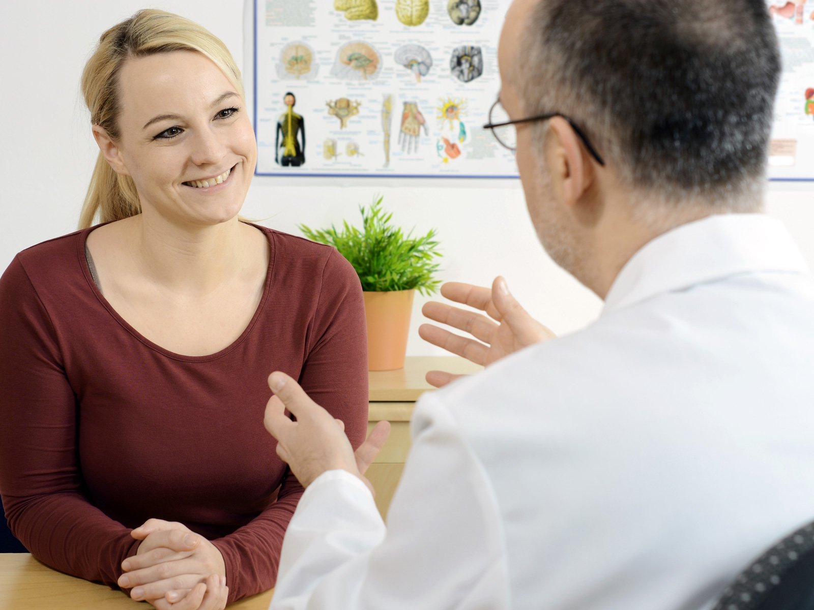 Dr talking with patient